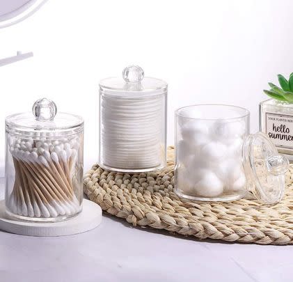Put cotton wool buds and pads in pretty apothecary jars