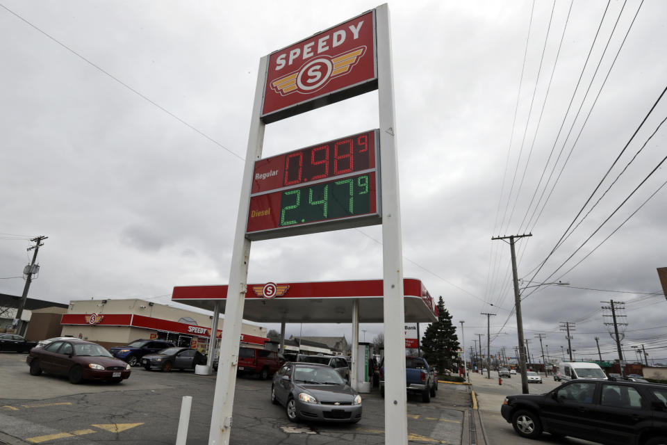 Speedy's Grub Shack is selling gas for 98.9 cents a gallon, Monday, March 30, 2020, in Cleveland. Oil started the year above $60 and has plunged on expectations that a weakened economy will burn less fuel. The world is awash in oil, meanwhile, as producers continue to pull more of it out of the ground. (AP Photo/Tony Dejak)