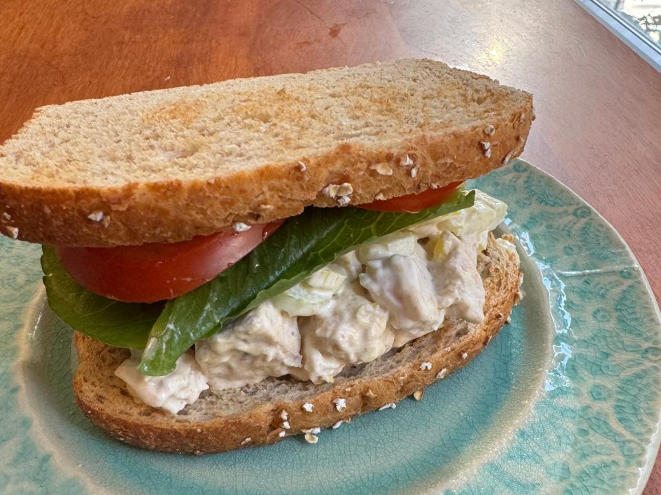 chicken salad sandwich with lettuce and tomato