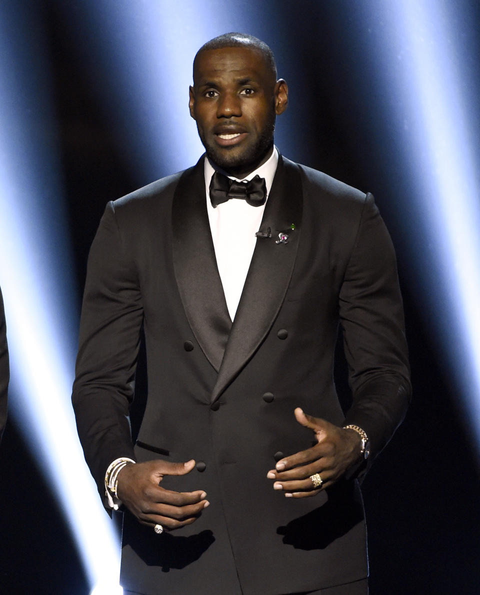 FILE - NBA player LeBron James speaks at the ESPY Awards on July 13, 2016, in Los Angeles. James, Viola Davis and Sterling K. Brown are among several honorees at the AAFCA TV Honors later this month. The African American Film Critics Association announced the recipients of the second annual event on Wednesday. The virtual ceremony is scheduled to air Aug. 22.(Photo by Chris Pizzello/Invision/AP, File)