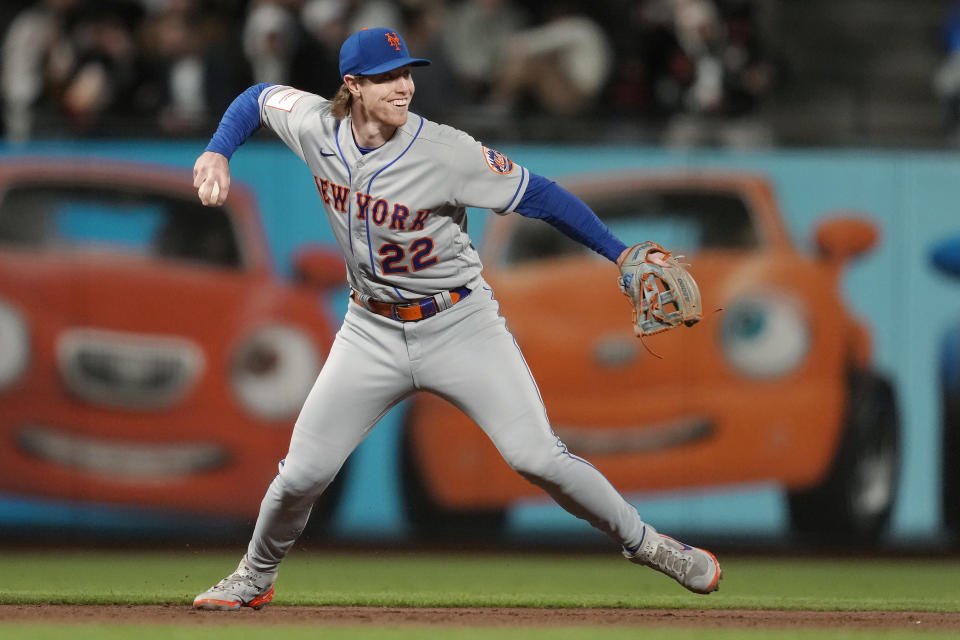 New York Mets third baseman Brett Baty throws to second base to force out San Francisco Giants’ Thairo Estrada on a double play hit into by Wilmer Flores during the sixth inning of a baseball game in San Francisco, Friday, April 21, 2023. (AP Photo/Jeff Chiu)