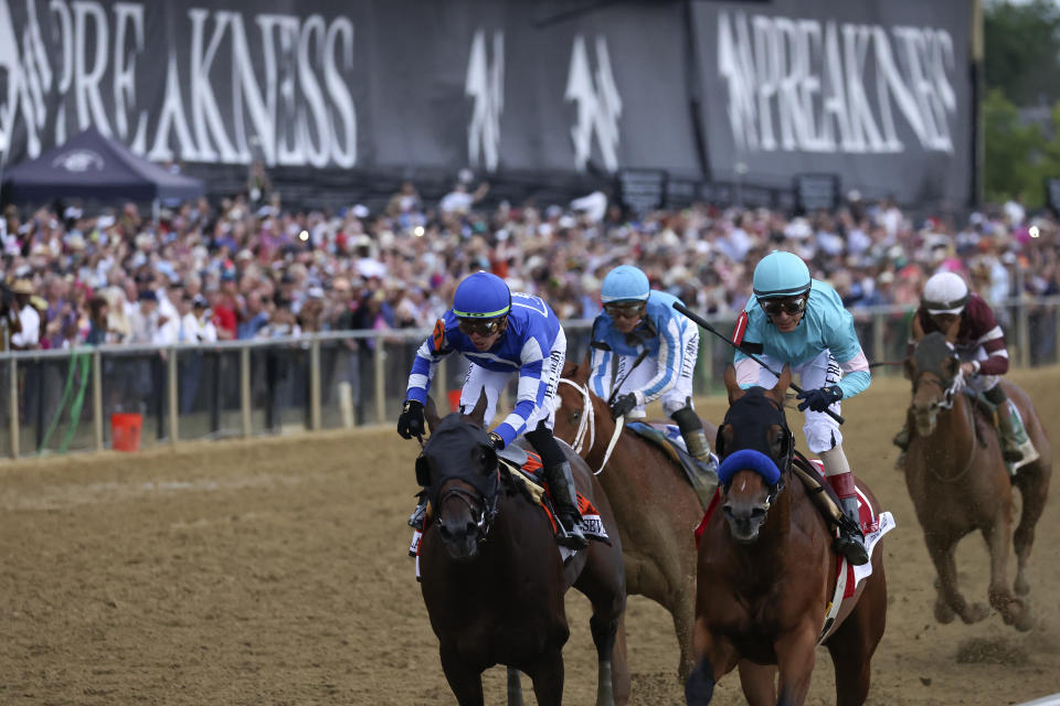 National Treasure, second from right, with jockey John Velazquez, edges out Blazing Sevens, with jockey Irad Ortiz Jr., left, to win the148th running of the Preakness Stakes horse race at Pimlico Race Course, Saturday, May 20, 2023, in Baltimore. Kentucky Derby winner Mage, second from left, finished third. (AP Photo/Julia Nikhinson)