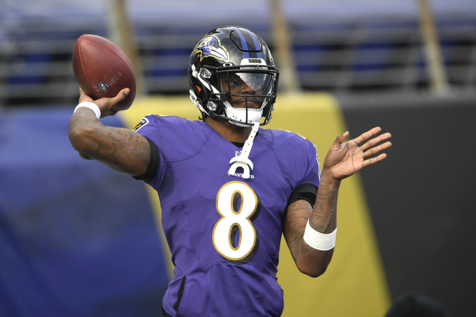 Baltimore Ravens quarterback Lamar Jackson works out prior to an NFL football game against the Jacksonville Jaguars, Sunday, Dec. 20, 2020, in Baltimore. (AP Photo/Nick Wass)