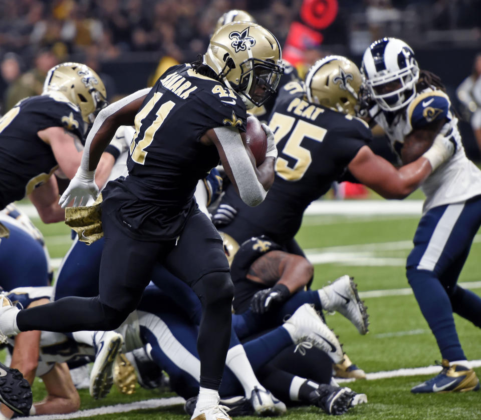 New Orleans Saints running back Alvin Kamara (41) crosses the end zone for a touchdown in the first half of an NFL football game against the Los Angeles Rams in New Orleans, Sunday, Nov. 4, 2018. (AP Photo/Bill Feig)