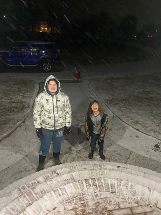 Alexis and AC Smith are enjoying the snowfall in Cornersville (Courtesy: Kayla Smith)