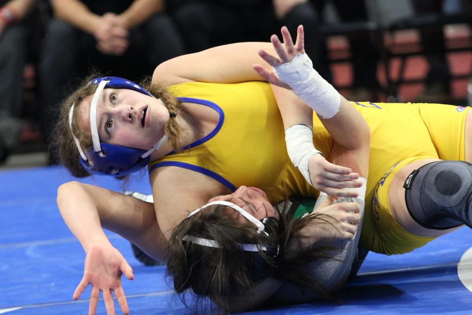 Katrina Gibson of Aberdeen Central pinned Elena Brennan of Kimball-White Lake/Platte-Geddes to win the girls' 154-pound title on Friday, Feb. 24, 2023 in the South Dakota State Wrestling Championships at Rapid City, Gibson became the first Golden Eagle to win a state girls championship.