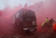 <p>Soccer Football – Champions League Quarter Final First Leg – Liverpool vs Manchester City – Anfield, Liverpool, Britain – April 4, 2018 Liverpool fans set off flares and throw missiles at the Manchester City team bus outside the stadium before the match Action Images via Reuters/Carl Recine </p>