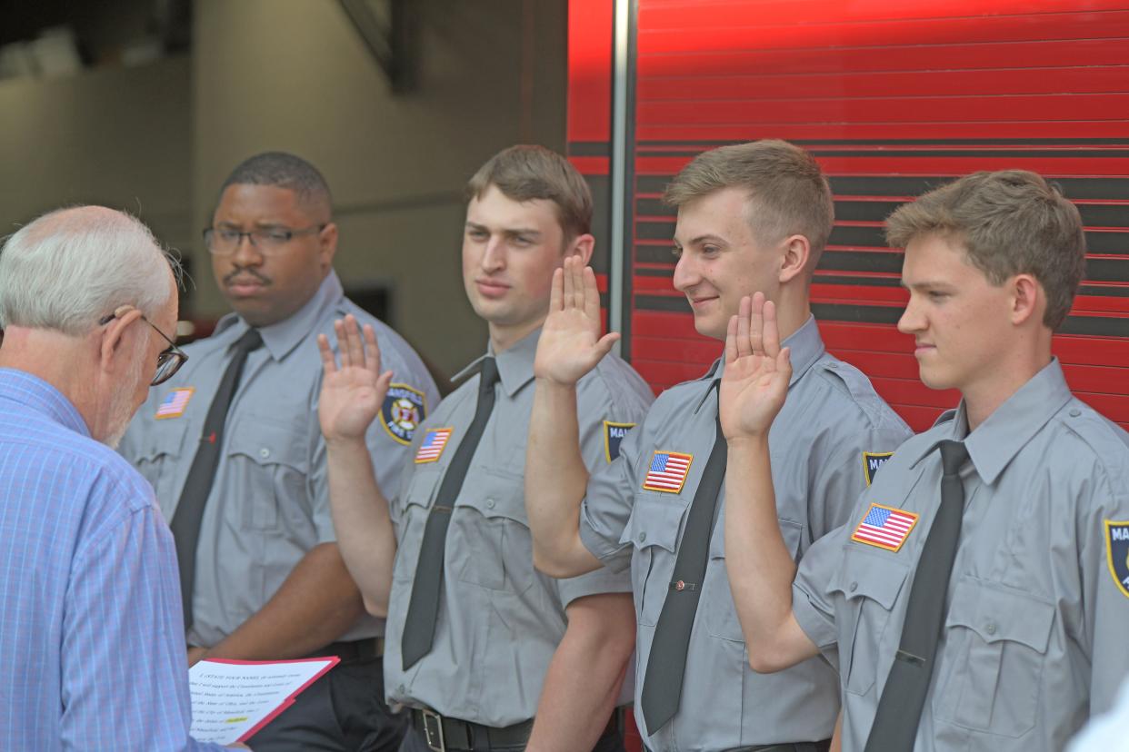 Bailey Damron, Colin Dawson, Kyler Roberts and Tyrell White were sworn in Monday morning as Mansfield's newest firefighters during a ceremony at Station 1.