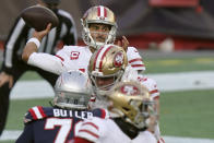 San Francisco 49ers quarterback Jimmy Garoppolo passes against the New England Patriots in the first half of an NFL football game, Sunday, Oct. 25, 2020, in Foxborough, Mass. (AP Photo/Steven Senne)