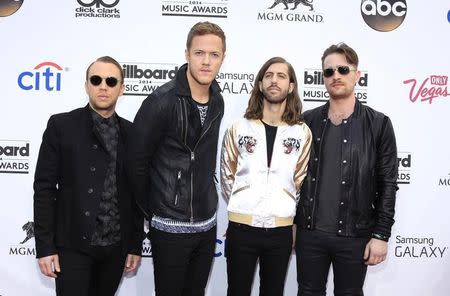 Recording artists Ben McKee, Dan Reynolds, Wayne Sermon and Daniel Platzman (L-R) of Imagine Dragons arrive at the 2014 Billboard Music Awards in Las Vegas, Nevada May 18, 2014. REUTERS/L.E. Baskow