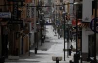 A view of the empty shopping La Bola street in downtown Ronda