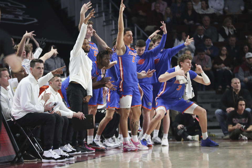 Florida celebrates a made 3-pointer during the first half of an NCAA college basketball game against South Carolina Saturday, March 2, 2024, in Columbia, S.C. (AP Photo/Artie Walker Jr.)