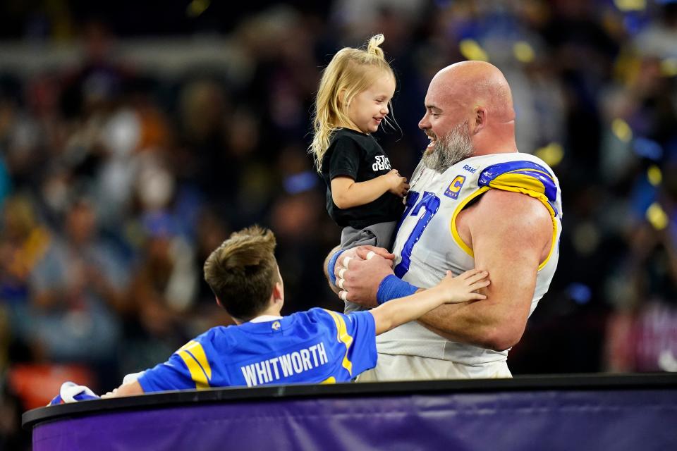 Andrew Whitworth celebrates his Super Bowl 56 victory with his children. Whitworth will join the Bengals Beat Podcast live edition Wednesday at 12:30 p.m. at the Holy Grail Banks.
