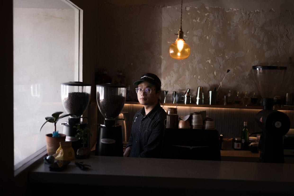 Wang Binqi at Mer coffee shop in Beijing. (Fred Dufour / NBC News)