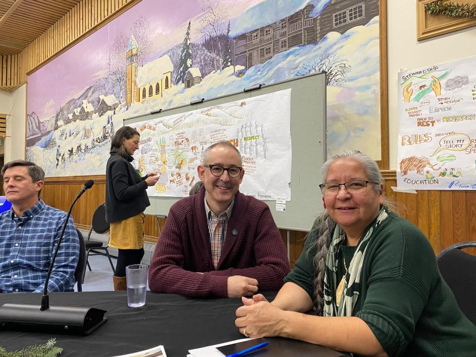 Yukon government paleontologist Grant Zazula, with Debbie Nagano, heritage director with the Tr'ondëk Hwëch'in First Nation, at a community gathering to discuss plans for a baby wooly mammoth specimen found in 2022 near Dawson City, Dec. 5, 2023.