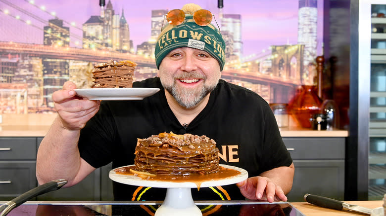 Duff Goldman holds pancakes