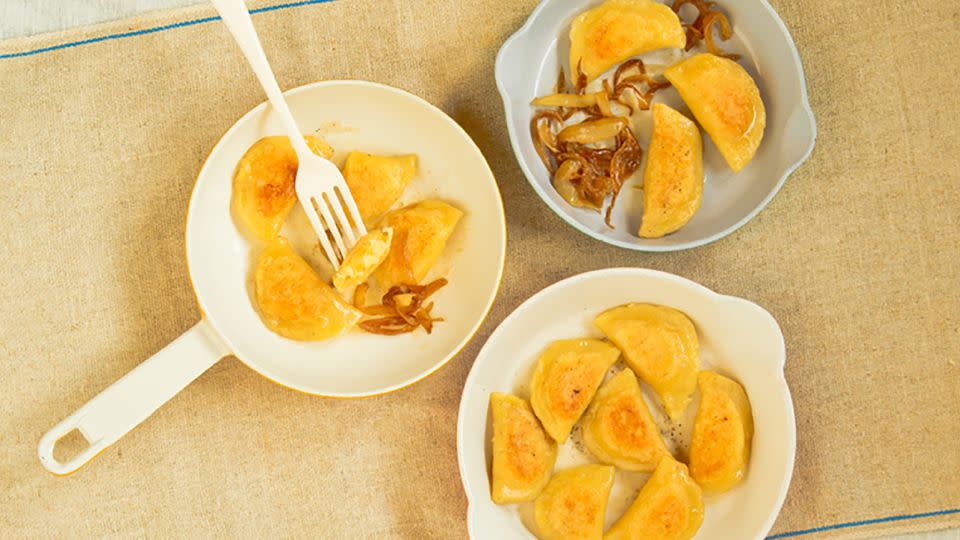 Fall's cooler weather practically begs for a plate of potato- and cheese-filled pierogies with a side of caramelized onions. - Casey Barber/Good Food Stories LLC