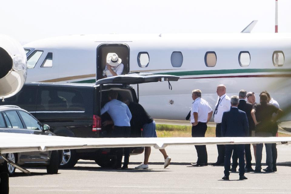 A photo of Meghan Markle holding baby Archie close as she and Harry arrive in Nice, France on August 14, 2019. Photo: MEGA.