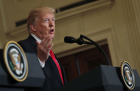 U.S. President Donald Trump answers a question during a joint news conference with Norwegian Prime Minister Erna Solberg at the White House in Washington, U.S., January 10, 2018. REUTERS/Carlos Barria/Files