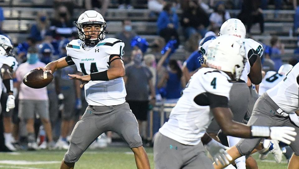 Gulf Coast High School’s Konnor Barrett (14) looks to pass the ball during their game with Barron Collier High School in Naples, Friday, Oct. 2, 2020. (Photo/Chris Tilley)