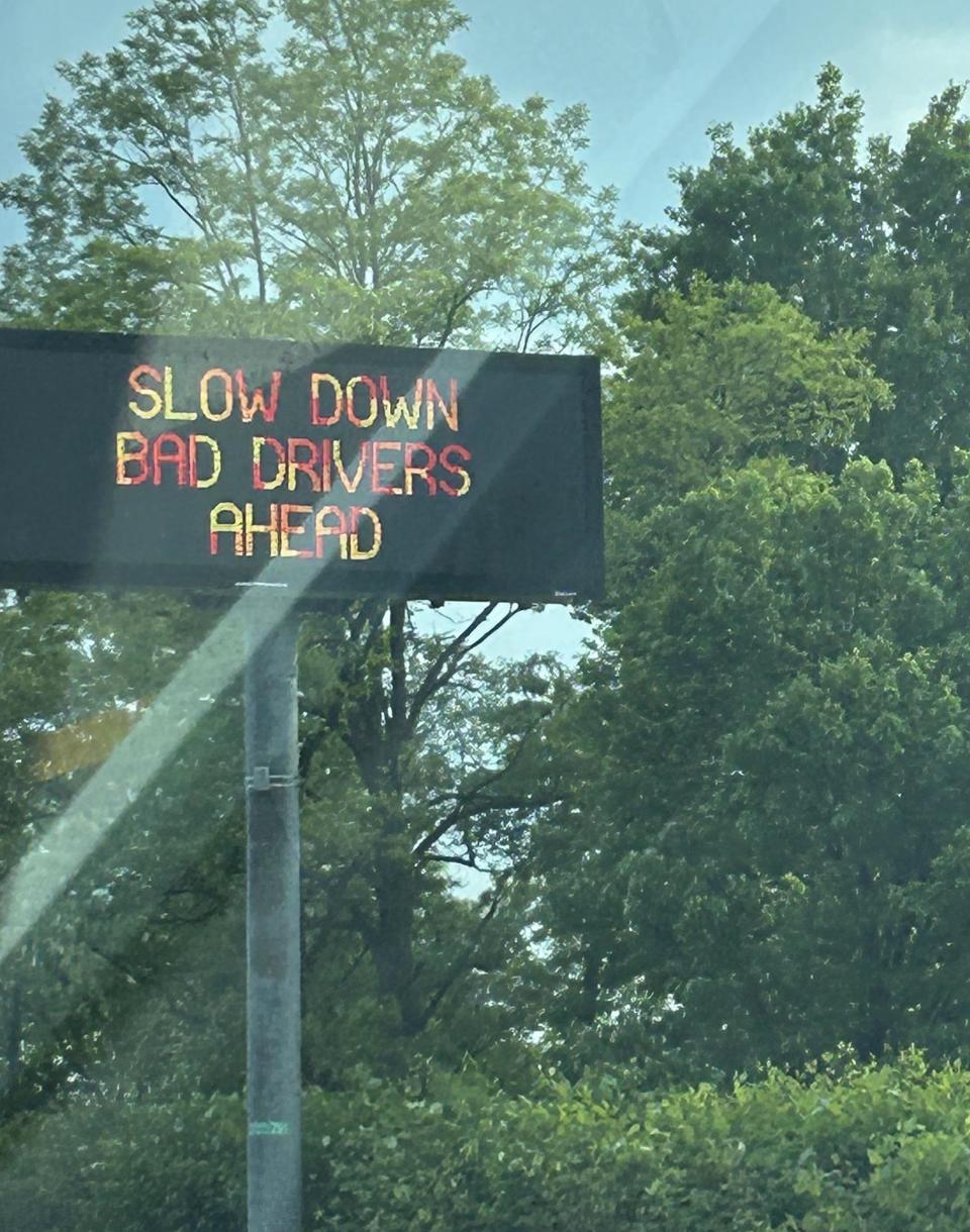 A road sign in New Jersey that says "Slow down bad drivers ahead."