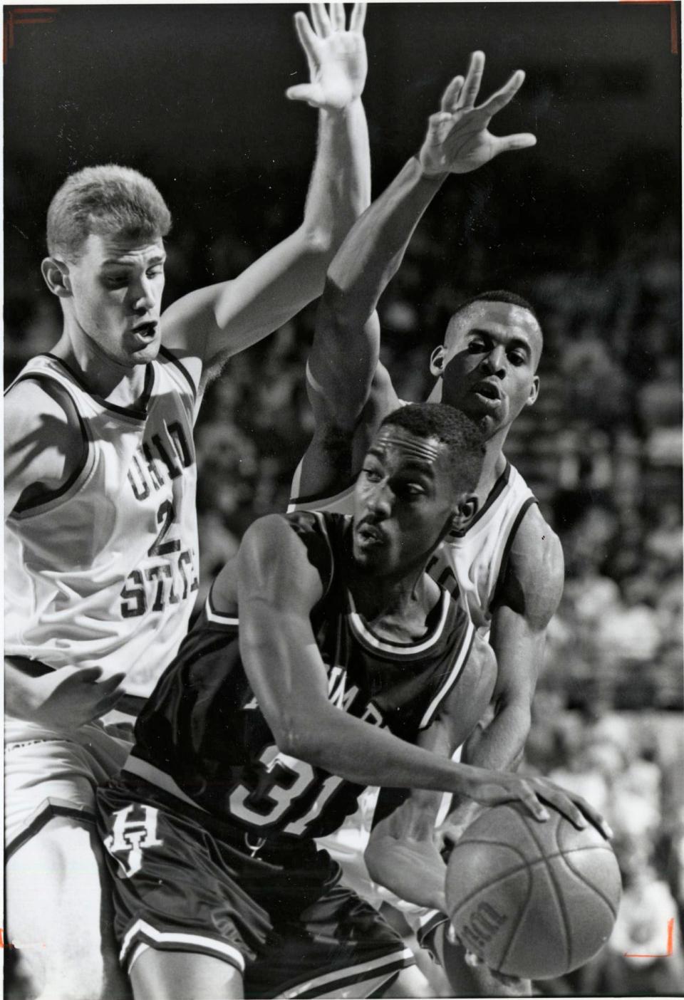 (Jent Robertson March 5 1992) Ohio State's Chris Jent, left, and Jammal Brown, right, guard a Howard University player during a game at St. Johns Arena, March December 15, 1991. (Dispatch photo by Chris Russell)