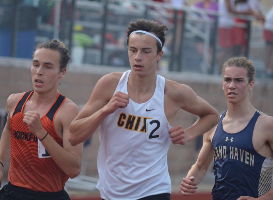 Zeeland East's Caden Meyer runs the 3,200 meters.