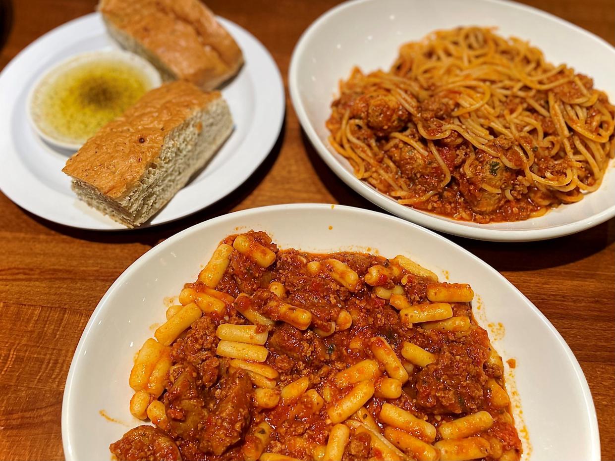 Cavatelli pasta with Italian sausage and beef bolognaise sauce, spaghetti and meatballs and fresh focaccia bread from Cavatelli Pasta Kitchen in Ormond Beach.