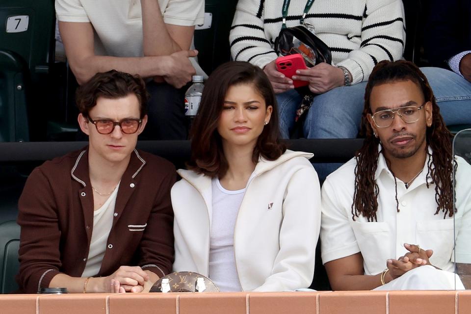 Tom Holland and Zendaya watch Carlos Alcaraz of Spain play Daniil Medvedev of Russia during the Men's Final of the BNP Paribas Open at Indian Wells Tennis Garden on March 17, 2024 (Getty Images)