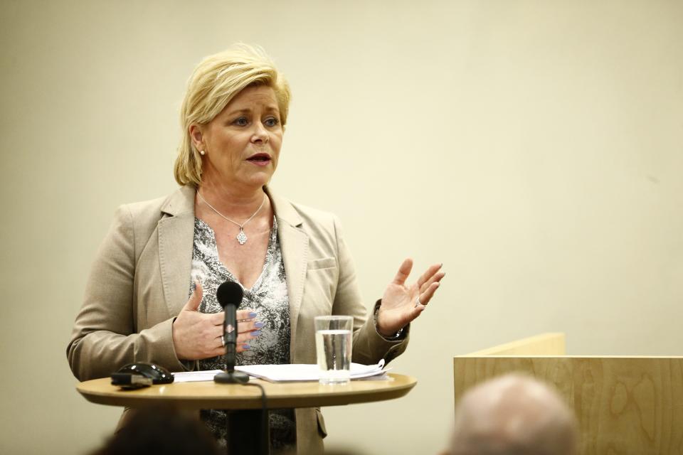 Norwegian Minister of Finance Siv Jensen presents the parliamentary report of the Norwegian Pension fund (Oil fund) in Oslo, Friday, April 4, 2014. Norway is considering excluding foreign oil and coal companies from its $860 billion sovereign wealth fund, which manages profits from Norway’s own fossil fuel industry. In a shakeup of the fund that sharpens its environmental focus, Finance Minister Siv Jensen said she had appointed a panel to assess the question on the grounds of possible damage to the climate. It will report back to the government in November. The move highlights Norway’s ambition to be a climate leader globally, while continuing to hunt for oil and gas in its own waters. (AP Photo/Erlend Aas, NTB Scanpix) NORWAY OUT