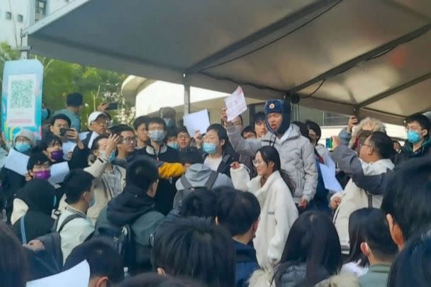 PHOTO: This frame grab from video footage made available via AFPTV on Nov. 27, 2022 shows students protesting against China's zero-Covid policy at Tsinghua University in Beijing. (-/AFPTV/AFP via Getty Images)