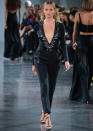 <p>Poly took the plunge at Mugler.</p>