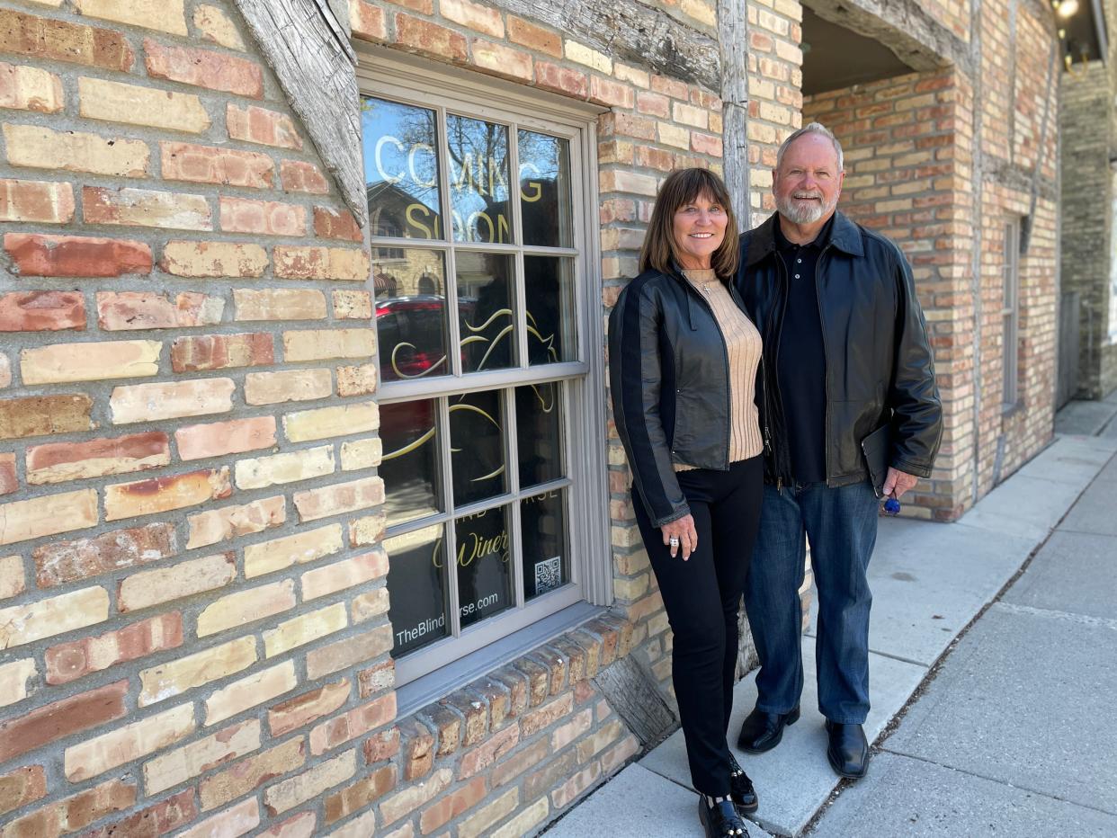 Connie and Bob Moeller stand in front of the second location of their Blind Horse Winery, this one at W63N674 Washington Ave., Cedarburg. They opened their first location in Kohler in 2014.