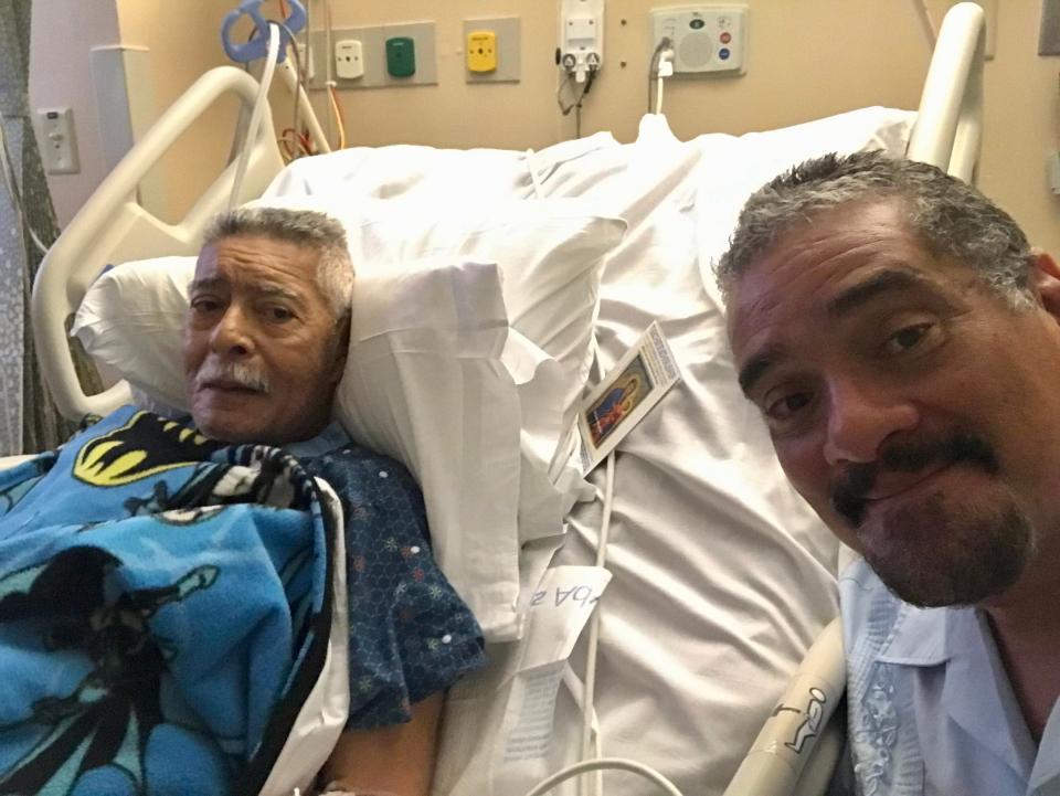 Engagement editor John A. Torres (right) and his dad, Rick Torres during a recent hospital scare.