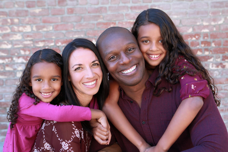 Shola Richards with his family. (Keats Elliott)