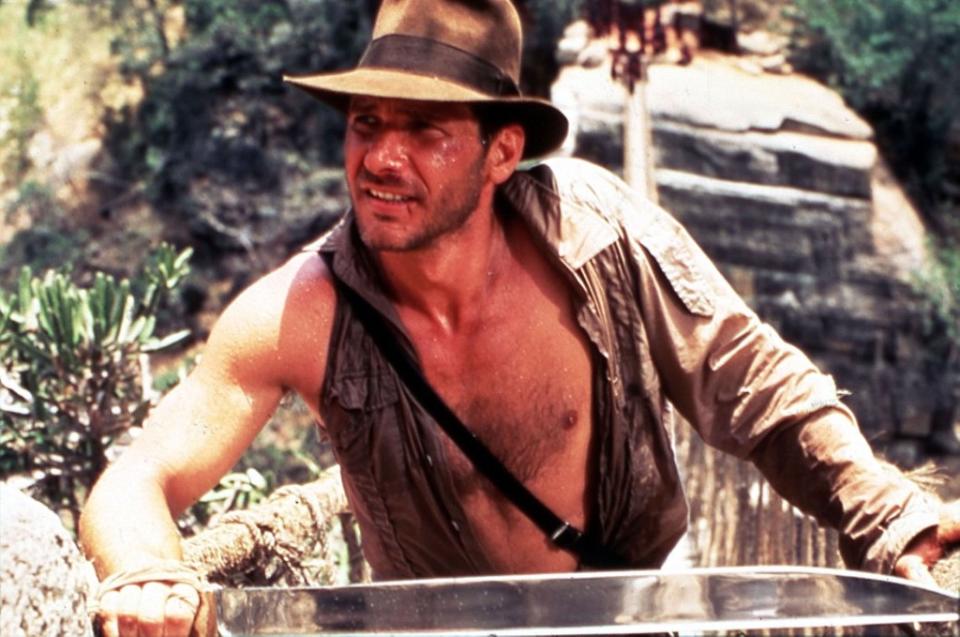 Harrison Ford in “Indiana Jones and the Temple of Doom” (1984). Ronald Grant Archive / Mary Evan