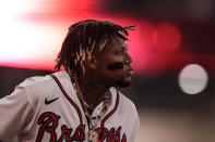 Atlanta Braves' Ronald Acuna Jr. (13) walks off the field during the eighth inning of Game 1 of a baseball NL Division Series against the Philadelphia Phillies, Saturday, Oct. 7, 2023, in Atlanta. (AP Photo/Brynn Anderson)