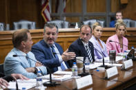 Former University of Alabama Head Football Coach Nick Saban, from left, Sen. Ted Cruz, R-Texas, Commissioner of the Atlantic Coast Conference (ACC) Jim Phillips, former University of Miami student-athlete Hanna Cavinder and TCU student-athlete Haley Cavinder participate in a roundtable on the future of college athletics and the need to codify name, image and likeness rights for student athletes, on Capitol Hill, Tuesday, March 12, 2024, in Washington. (AP Photo/Manuel Balce Ceneta)