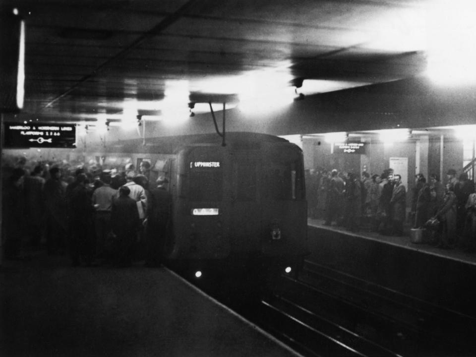 Large numbers of people using the underground system to get around London during a period of heavy smog, which hampered transport on the roads on December 8, 1952.