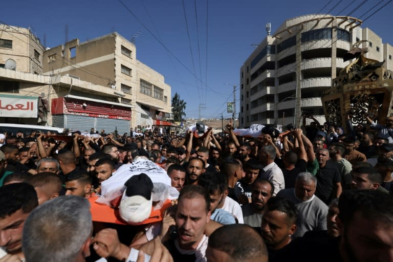 A large crowd gathered for the funeral procession of men killed in an Israeli air strike in Tubas, after Israeli troops withdrew from the area in the occupied West Bank (JAAFAR ASHTIYEH)