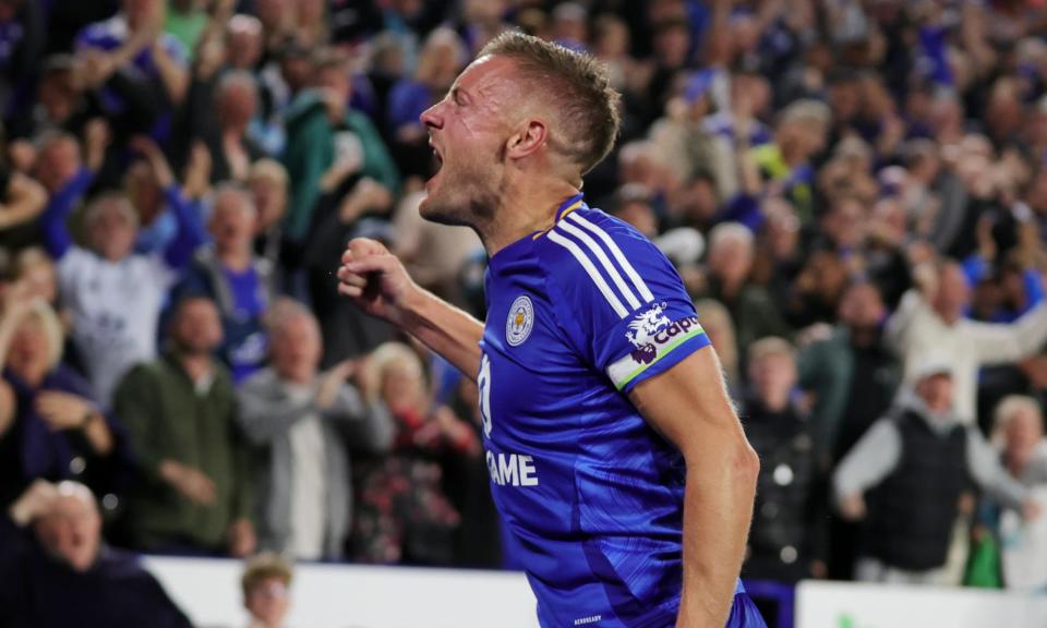 <span>Jamie Vardy celebrates in front of the joyous home fans after scoring Leicester’s equaliser.</span><span>Photograph: Plumb Images/Leicester City FC/Getty Images</span>