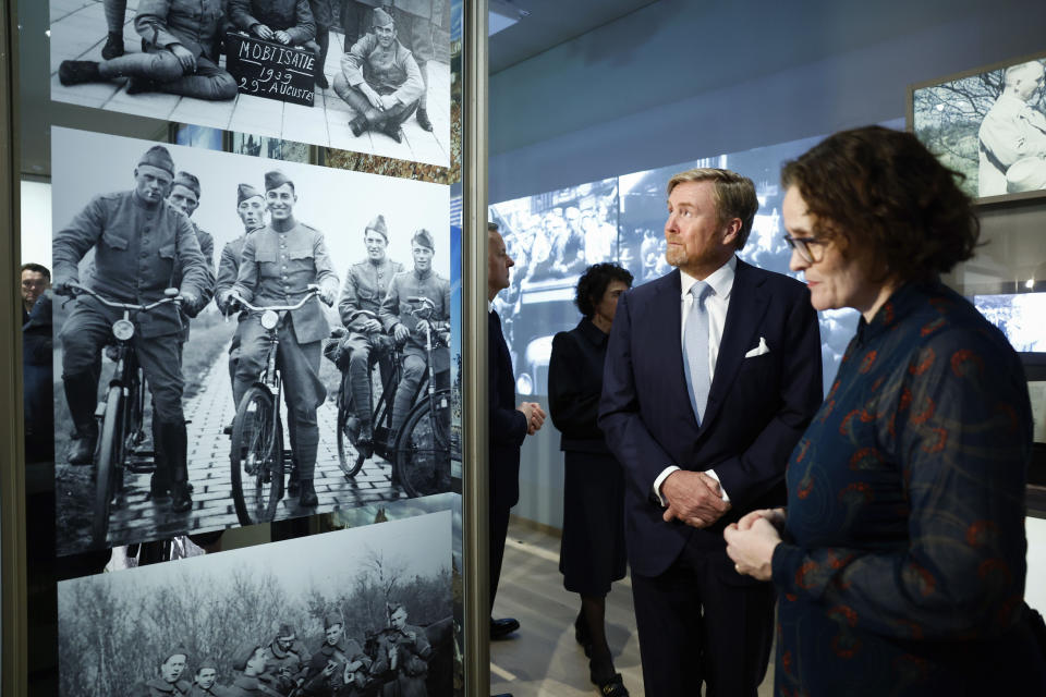 Netherlands' King Willem Alexander, second right, tours the National Holocaust Museum in Amsterdam, Netherlands, Sunday, March 10, 2024. The Netherlands's National Holocaust Museum is opening on Sunday in a ceremony presided over by the Dutch king as well as Israeli President Isaac Herzog, whose presence is prompting protest because of Israel's deadly offensive against Palestinians in Gaza. (Piroschka van de Wouw/Pool Photo via AP)