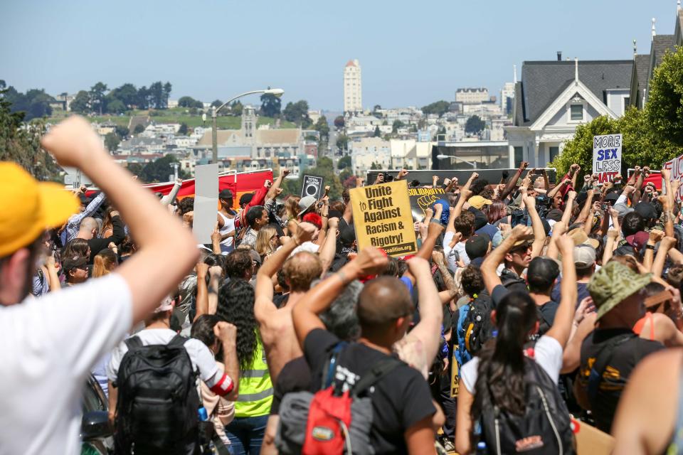 <p>Protesters who showed up to counter-protest Joey Gibson’s press conference, the organizer who cancelled the Crissy Field ” Patriot Prayer”, continue their demonstration despite Gibson cancelling again on August 26, 2017 at Alamo Square in San Francisco, Calif. (Photo: Amy OsborneAFP/Getty Images) </p>