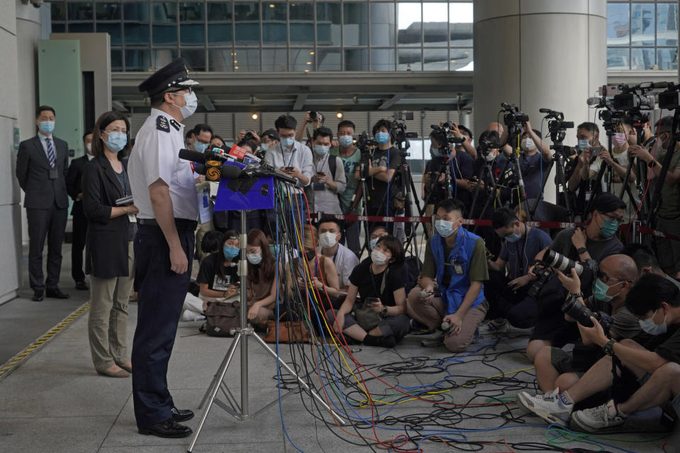 Chris Tang, commissioner of the Hong Kong Police Force, speaks during a press conference in Hong Kong, Wednesday, May 12, 2021. A top Hong Kong national security officer was reportedly caught up in a raid on an unlicensed massage business, and will face a police force investigation into the alleged misconduct. Hong Kong’s Director of National Security Frederic Choi has since been put on leave after the incident, according to Tang. (AP Photo/Kin Cheung)