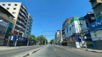 Empty streets and closed businesses are seen as locals stage a "silent strike", in Yangon