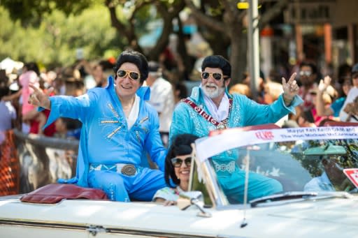 Australia's Deputy Prime Minister Michael McCormack (L) and Parkes Mayor Ken Keith (R) took part in the street parade during the 2019 Parkes Elvis Festival