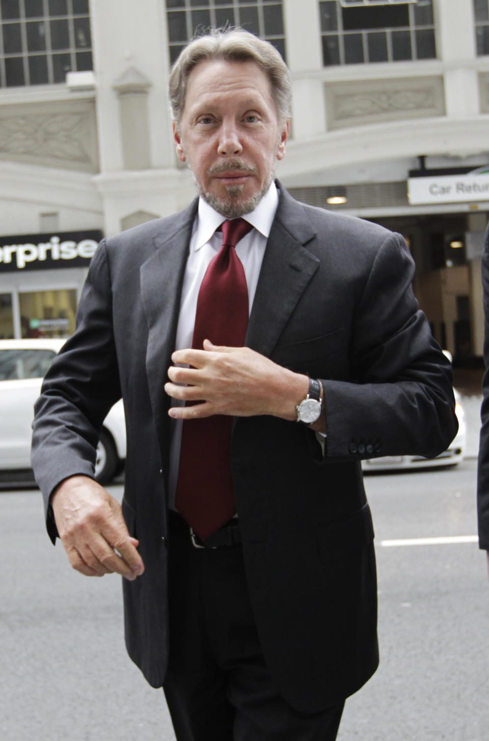 Oracle CEO Larry Ellison arrives for a court appearance at a federal building in San Francisco, Tuesday, April 17, 2012. Oracle intends to rely heavily on Google's own internal emails to prove Google's top executives knew they were stealing a popular piece of technology to build the Android software that now powers more than 300 million smart phones and tablet computers. (AP Photo/Paul Sakuma)