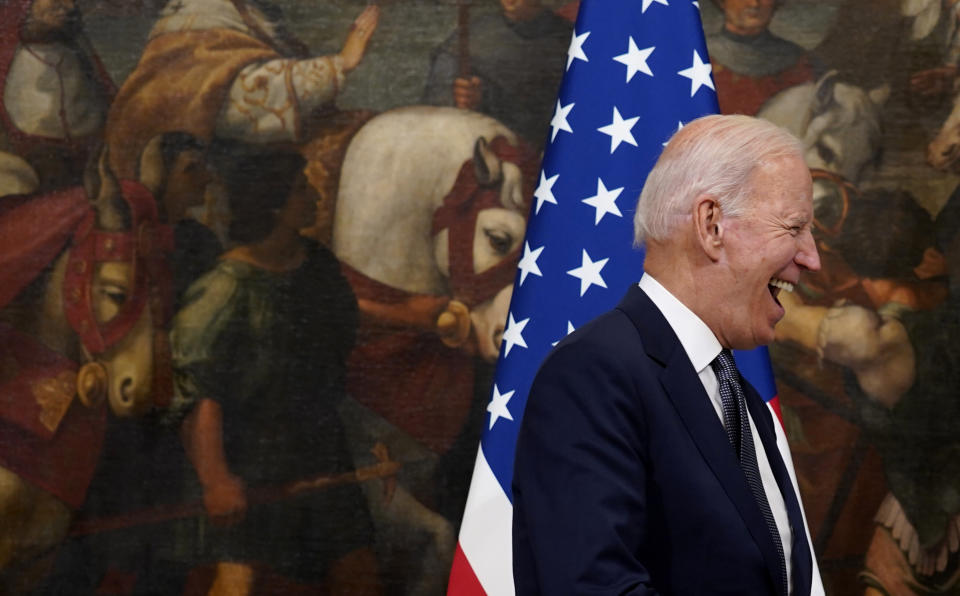 U.S. President Joe Biden prepares to shake hands with Italy's Prime Minister Mario Draghi prior to a ceremony at the Chigi Palace in Rome, Friday, Oct. 29, 2021. A Group of 20 summit scheduled for this weekend in Rome is the first in-person gathering of leaders of the world's biggest economies since the COVID-19 pandemic started. (AP Photo/Evan Vucci)