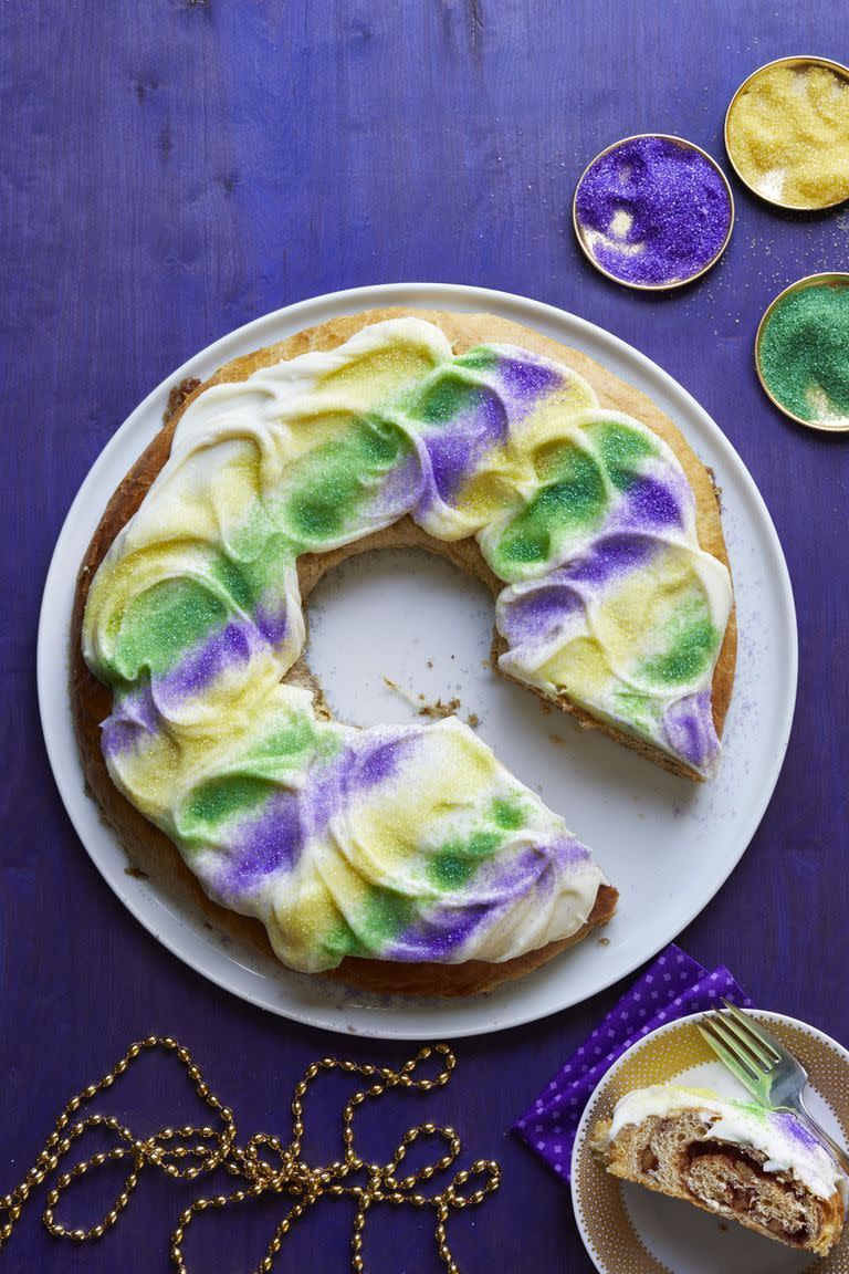 <p>This pastel-striped cake (which is filled with pecans, brown sugar, and cinnamon) rivals the prettiness of an Easter egg. </p><p>Get the <strong><a href="https://www.womansday.com/food-recipes/food-drinks/recipes/a61040/king-cake-recipe/" rel="nofollow noopener" target="_blank" data-ylk="slk:King Cake recipe.;elm:context_link;itc:0;sec:content-canvas" class="link ">King Cake recipe. </a></strong></p>