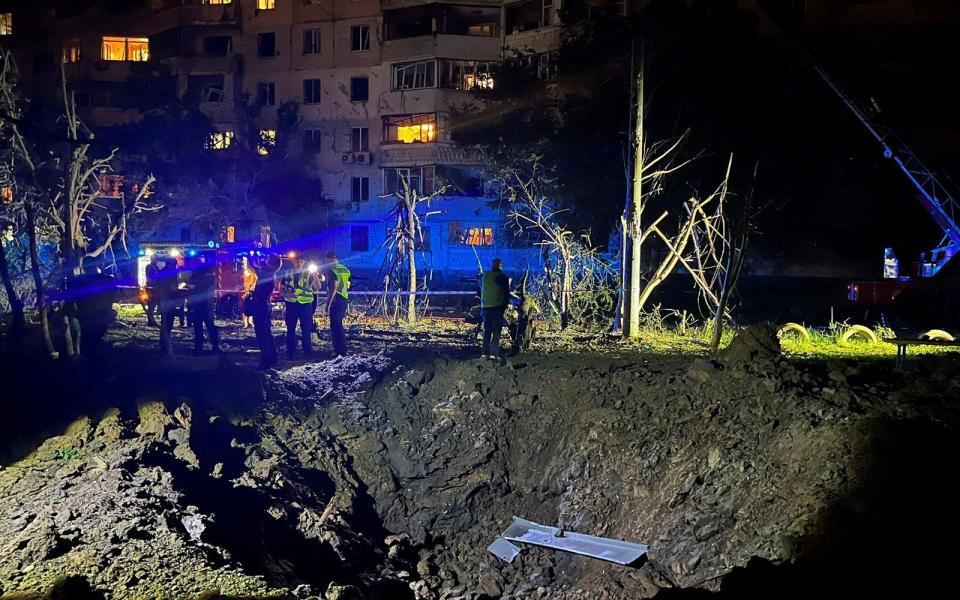 Firefighters work near an apartment building damaged during a massive Russian drone strike, amid Russia's attack on Ukraine, in Odesa, Ukraine June 10, 2023. via REUTERS ATTENTION EDITORS - THIS IMAGE HAS BEEN SUPPLIED BY A THIRD PARTY. - Reuters